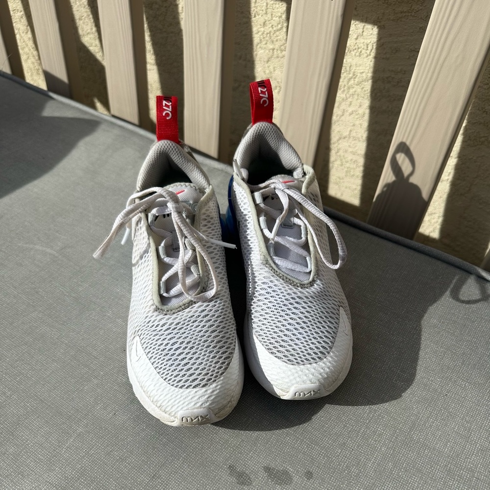 White and blue boys Nike air max cross trainers